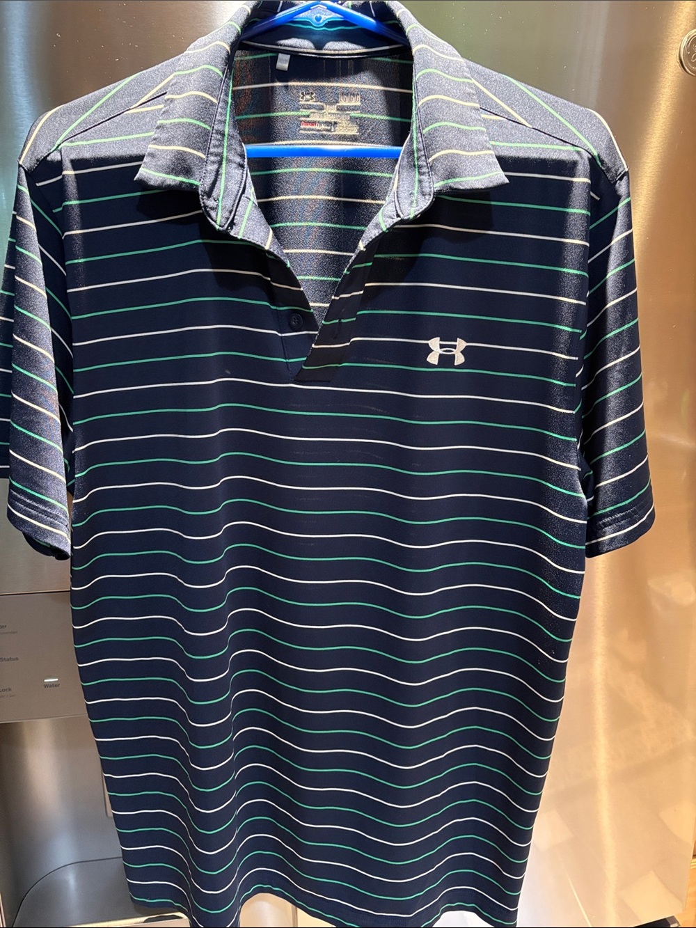 Under armour men’s Navy Polo with Teal and White Stripes